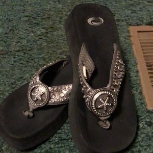 Studded star flip flops